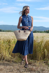 a lady in a solid denim dress